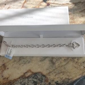 Brand new 7.25 in bracelet. SS diamond chips